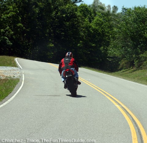 fast-motorcyclist-passing-slower-motorcycles (2).jpg